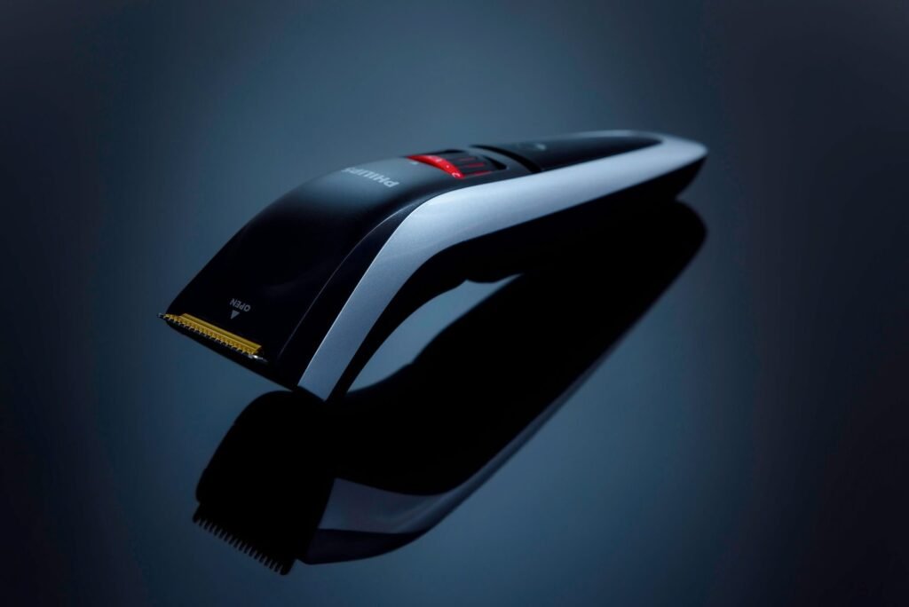 una máquina clipper o recortadora de pelo negra,SPBarber